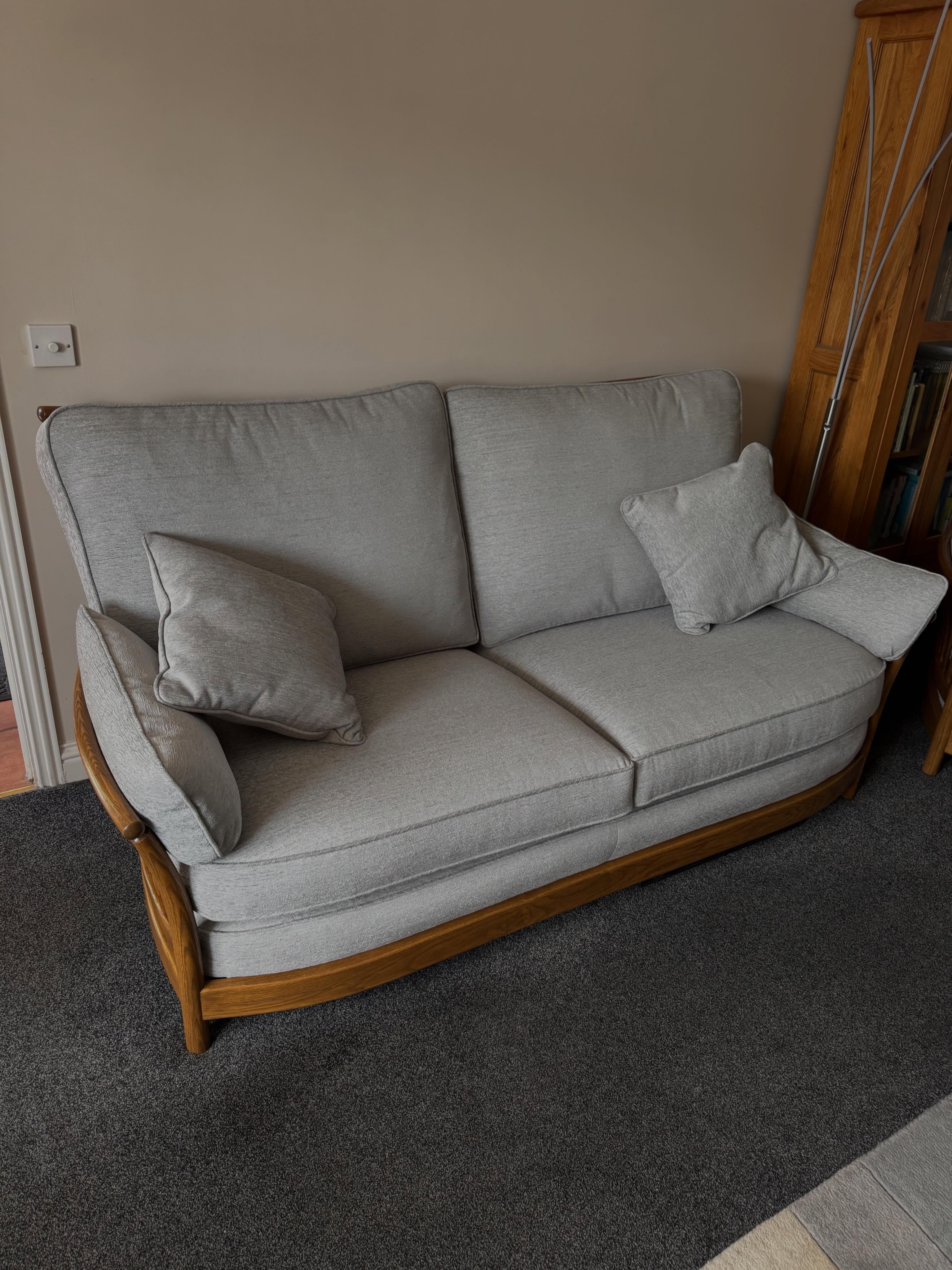 Ercol sofa with new pale grey cushion covers
