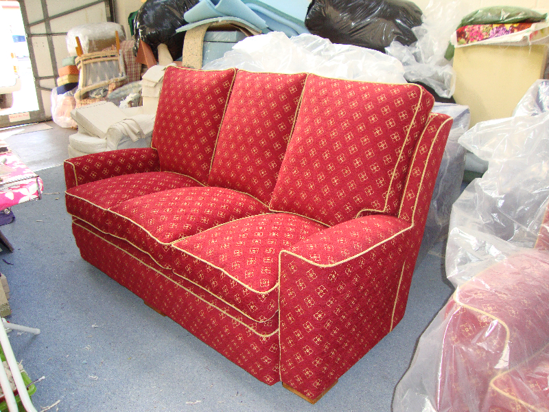 Three-seater sofa in claret trellis fabric with contrast gold piping