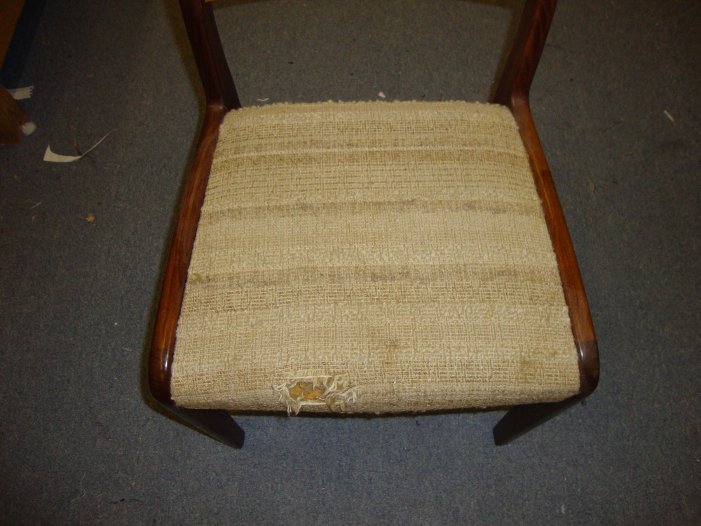 Worn screw in chair seat before upholstery